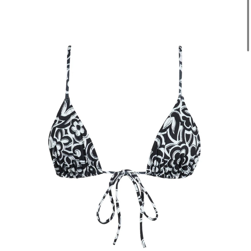 “Capri” triangle front tie bikini top and high cut full bottoms. Heavy manners